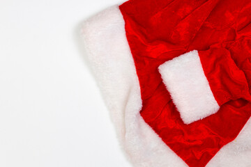 Part of Santa Claus clothing isolated on white. Red fur. Flat lay.