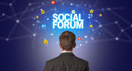 rear view of a businessman with social forum inscription, social networking concept