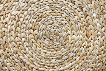 Wicker texture. Background of reed weaving. Rough weaving from straw.