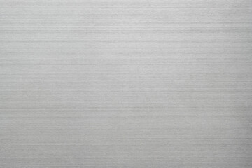 Poster - silver metal texture of brushed stainless steel plate with the reflection of light.