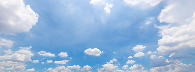 Wall Mural - panorama or panoramic photo of blue sky and white clouds or cloudscape. for breathing concepts backg
