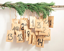 Handmade Advent Calendar. Gift Bags Hanging On The Rope. Eco Friendly Christmas Gifts Diy