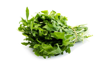 Wall Mural - Bundle of green arugula isolated on white background