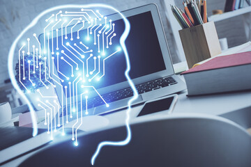 Double exposure of work space with computer and human brain drawing hologram. Brainstorm concept.