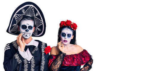 Poster - Young couple wearing mexican day of the dead costume over background touching mouth with hand with painful expression because of toothache or dental illness on teeth. dentist