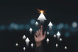 © Dilok - Hand rise up with increasing arrow for business growth and profit increase concept.