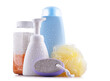 Plastic contaiers of shampoos and shower gels isolated on white