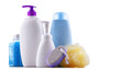 Plastic contaiers of shampoos and shower gels isolated on white