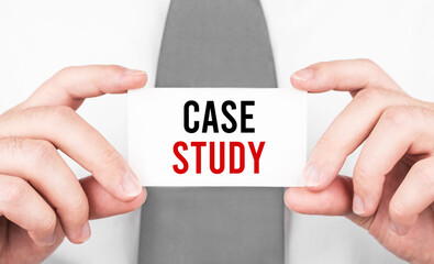 Aufkleber - Businessman holding a card with text CASE STUDY ,business concept