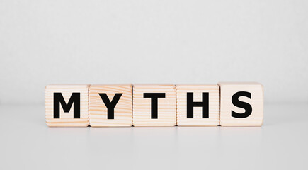 Poster - Myths word on wooden cubes. Myths concept