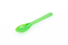 Green Plastic Spoon Isolated On White Background.