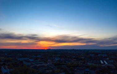 Sunset over an industrial area of the city