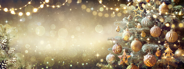 Wall Mural - Vintage Christmas Tree With Retro Ornament And Golden Shiny Glitter In The Defocused Background