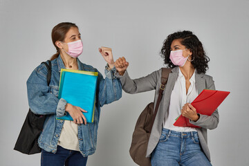 Wall Mural - University student ready to study with a mask due to the covid-19 pandemic