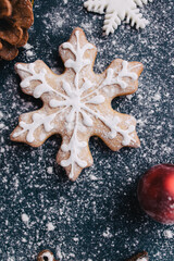 Wall Mural - Christmas and New Year holidays preparations. Family traditions, DIY, celebration concept. Festive background with homemade gingerbread cookies and embellishments