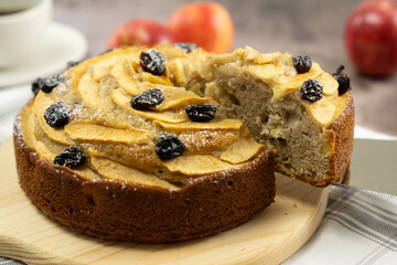 Wall Mural - Homemade round apple cinnamon cake or bread with dried cranberries