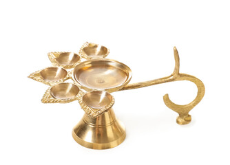 Diya lamp for celebration of Divaly on white background