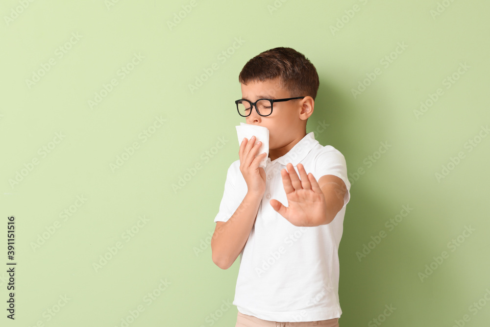 Allergic little boy on color background