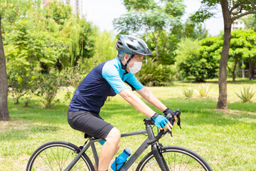 Asian old man riding bicycle