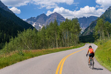 Biking To Maroon Bells - Bike Riding On Marron Creek Road, From Highlands To Marron Lake, Is The Best Way To Enjoy This One Of Colorado's Most Scenic Areas. Aspen, Colorado, USA.