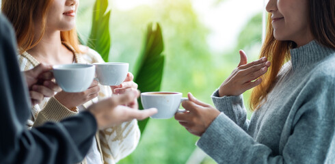 Canvas Print - Close up image of people enjoyed talking and drinking coffee together