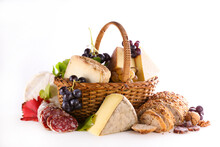 Wicker Basket With Cheese And Salami