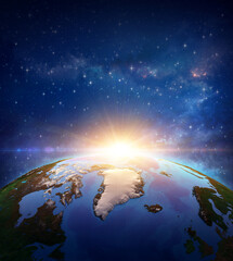 Wall Mural - surface of planet earth, space view of the world focused on europe. rising sun shining into deep spa