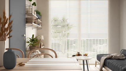 Cosy wooden sustainable living room in gray tones. Dining table with vases and ears of grain. Sofa, two coffee tables with teapot and tea cup. Environmental friendly interior design