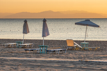 Wall Mural - sunrise over a sandy beach in rhodes