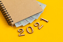Notepad With Euro Banknotes Inside And 2021 Made Of Wooden Parts