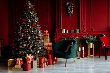 beautiful festively decorated room with a christmas tree. cozy living room in red tones with a styli