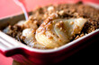 © Andrew Scrivani - Close up of baked pear with ginger crumble dessert