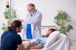 © Elnur - Young husband visiting sick wife in the clinic