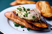 Eggs Poached In Buttery Sorrel Sauce On Toasted Bread