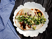 Close Up Of Chicken Quesadilla With Cucumber And Avocado Salsa