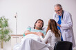 © Elnur - Young family at the hospital