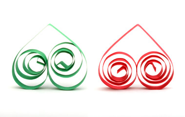 Wall Mural - A green and red quilling origami hearts on white