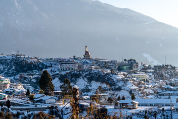 Giant buddha statue on top of a high mountain overlooking the town of Tawang, western Arunachal Pradesh, north east India.