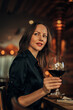 © eastwest photo - elegant woman drinking red wine