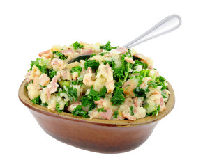 Wall Mural - Traditional Irish Colcannon in a rustic earthenware dish, Colcannon is made with mashed potato and kale or cabbage, isolated on a white background