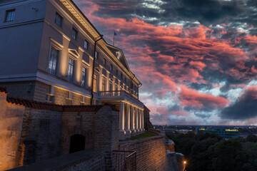 Wall Mural - The government house. Evening top view of night Tallinn, Estonia. Dramatic purple clouds in the sky