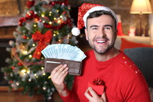 Man With Full Wallet During Christmas
