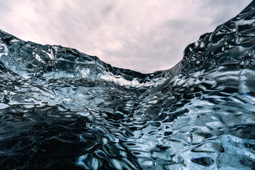 Abstract textures of glacial ice formations on the coast near Jökulsarlon, Iceland
