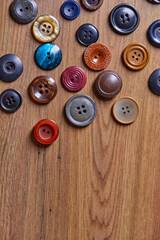 Fototapete - Background and texture of multicolored antique buttons