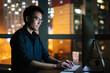 © JIACHUAN LIU/Stocksy - Businessman working in night