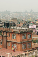 Old Redbrick Annex Of A Living House Against The Cityscape Of Kathmandu, Nepal