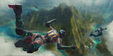 Fototapeta Młodzieżowe - Heroic players parachute into the chaotic action of a virtual battlefield below. A fictional image showing a video game scene of players descending towards a tropical island. 