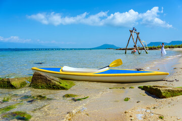 Wall Mural - Kayak is anchoring on the beach in Phu Quoc island, Kien Giang province, Vietnam.