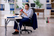 © Elnur - Hungry male employee waiting for food at workplace