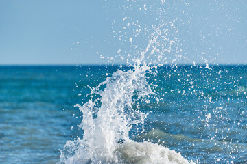 Wall Mural - Wave of the sea water at sunny day time.